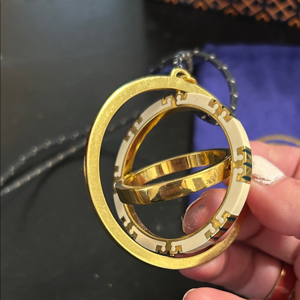 Tory Burch Navy and Gold Spinner Pendant Necklace, 24” - Picture 4 of 7